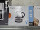 a box of a coffee maker sitting on a shelf
