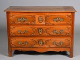an image of a wooden chest of drawers with brass handles