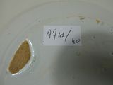 a piece of paper that has been left on a plate
