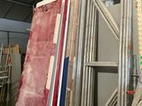 a man that is standing in a room with a ladder