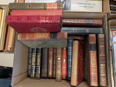 a box full of books sitting on top of a table