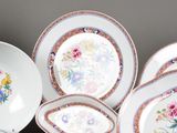 a group of plates and bowls on a table