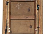 an old picture of a wooden frame with a picture in it