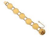 a gold bracelet with a coin charm on it