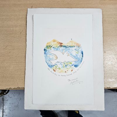a picture of a drawing of a fish on a piece of paper