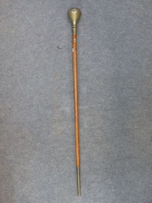 an image of a wooden stick with a metal handle