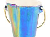 a blue and green bucket with handles on a white background