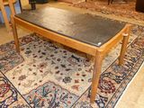 a coffee table that is on a rug in a living room