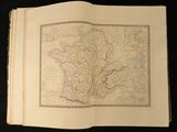 an open book with a map of the country of france on it