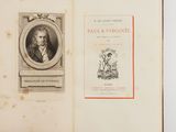 an open book with a picture of a man and a dog on it