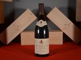 a bottle of wine that is sitting on a table