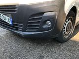 a white van parked on the side of the road