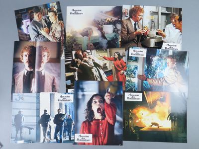 a lot of pictures of movies on the wall