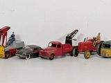 a lot of toy cars that are lined up in a row