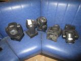 a lot of different types of lighting equipment on the couch