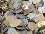 a pile of coins sitting on top of a table