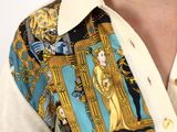 a woman that is wearing a shirt with a design on it