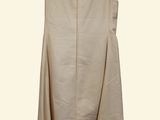 the back of a beige dress hanging on a hanger