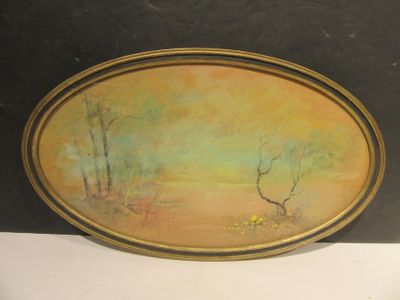 an image of a picture of a painting on a table