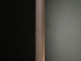 a lamp that is sitting on a table in the dark