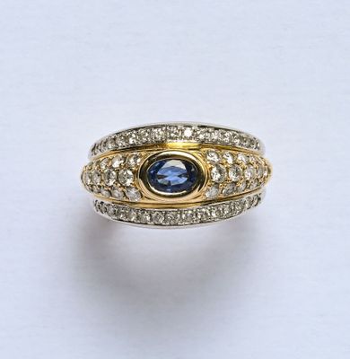 Bague en or 18K (750/oo) de 2 tons formant 3 joncs accolés, …