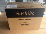 a box that is sitting on the floor in front of a window
