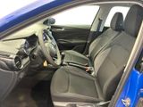 the interior of a blue car is clean and ready to be used