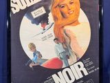 a framed movie poster of a woman in a white dress and a man in a blue shirt