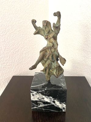 statue of a man on a horse on a marble base