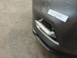 a close up of a car with a sticker on the front of it