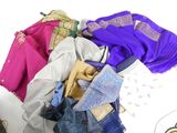 a pile of clothing that is sitting on a table
