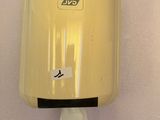 a paper towel dispenser hanging on the wall