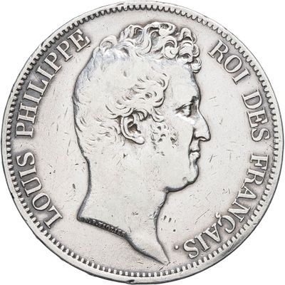 an image of a silver coin with a woman ' s face on it