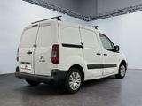 a picture of a white van parked in a garage