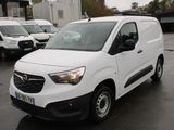 a white van that is parked in a parking lot