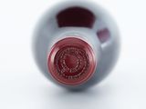 a bottle of wine that is sitting on a table