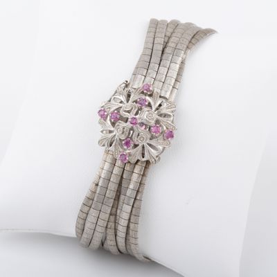 Bracelet 9 rangs semi-articulé or gris 18K, fermoir fleur or… - Photo 1