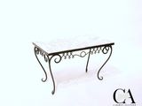 a small table that has a marble top on it
