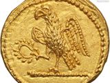 an image of a gold coin with a bird on it