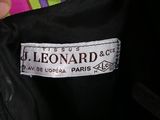 someone is holding a bag with a label on it that says leonard