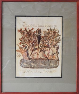 framed picture of a painting of a bird and a deer in a garden