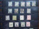 a picture of a display of stamps on the wall