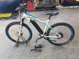a bicycle that is parked in a garage
