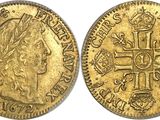 a gold coin with a cross on the front and a crown on the back