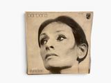 a close up of a magazine with a woman ' s face on it