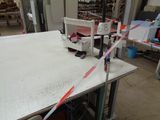 an image of a machine that is cutting a piece of paper