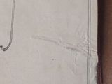 a book with a drawing of a flower on it
