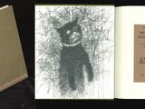 un livre sur la couverture duquel figure l'image d'un chat