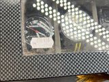 a close up of a car dashboard with a clock on it
