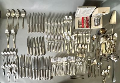 a lot of silverware on a table with a box of silverware